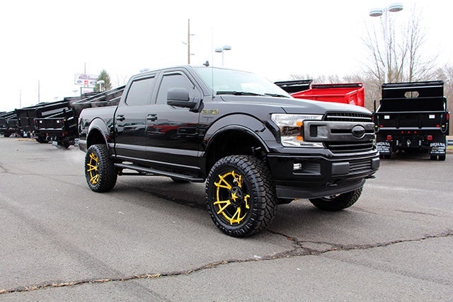 Custom Black F-150 with Jimmie Allen Yellow Rims at All American Ford of Hackensack in Hackensack NJ